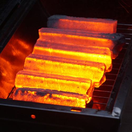 lit sawdust charcoal