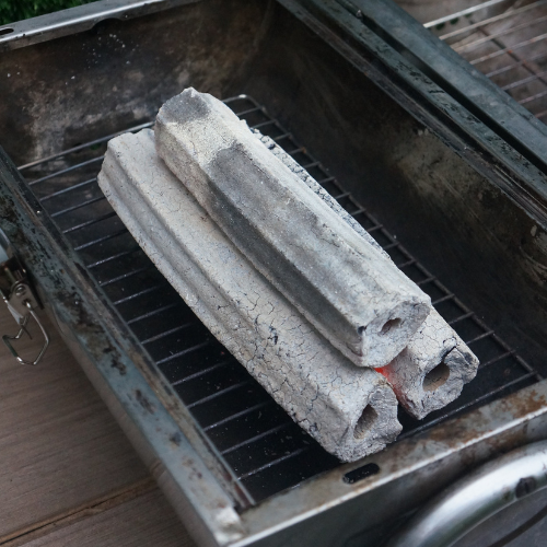 lit sawdust charcoal 2